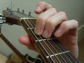 photo of E minor open guitar chord