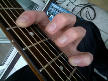 photo of cut down G shape barre chord photo of cut down G shape barre chord