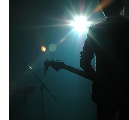 this guy is making more progress on guitar on stage this guy is making more progress on guitar on stage