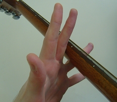 finger stretches using the guitar neck