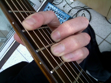 photo of the minor A form barre chord