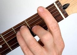 photo of an E shape guitar barre chord