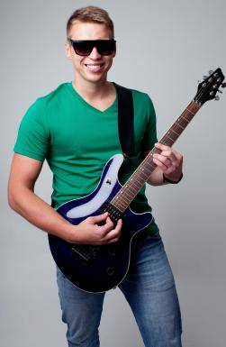How to Hold a Guitar Get it Right First Time